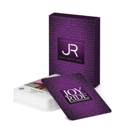 A purple Joy Ride deck box labeled 30 Sex Positions Flashcards stands upright, with a stack of playful illustrated cards in front; the top card shows the product title.