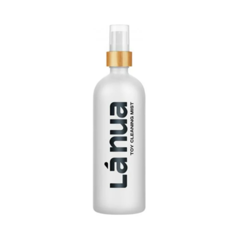White, fragrance-free spray bottle with a wooden cap labeled “Mist Toy Cleaner-6.8oz.”.
