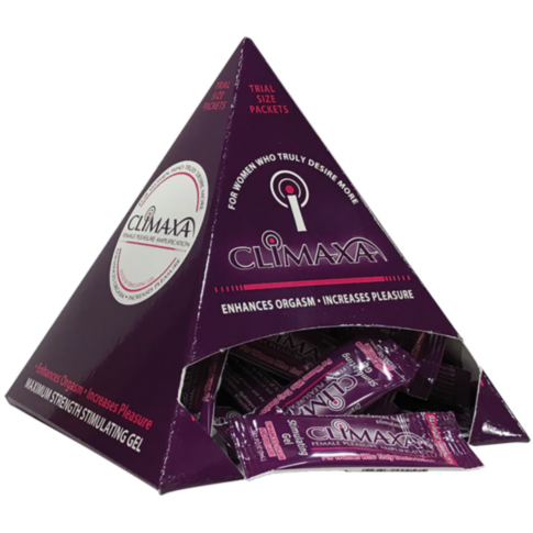 A purple pyramid display box holds trial-size packets of the Climax Female Pleasure Amplification Pillow Pack, a stimulating gel designed for women. The box highlights the product's purpose of enhancing orgasms and increasing pleasure.