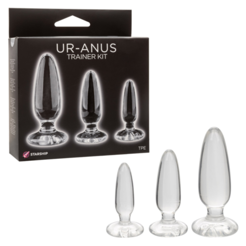 A box labeled Starship Ur-Anus Trainer Kit showcases three graduated transparent glass plugs. Below, the plugs are organized from smallest to largest, providing a complete training experience.