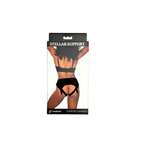 The image showcases the packaging for the Starship Stellar Support Comfort Harness, depicting a person from behind wearing a plush black harness and lingerie. The Starship brand is prominently displayed at the bottom of the package, highlighting its inter