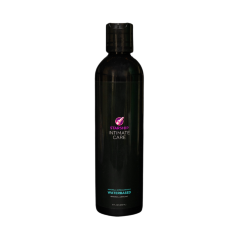 The 8oz Starship Intimate Care features a sleek black bottle with a purple and white label, promoting natural feeling effects in turquoise text. Its a water-based lubricant with a pH-friendly formula, hypoallergenic for sensitive skin, all under a conveni