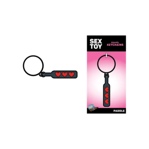 This novelty accessory, the Wood Rocket-Hearts Paddle Keychain, features an enchanting enamel keychain shaped like a paddle adorned with red hearts. On the right, the packaging is labeled "Sex Toy Enamel Keychains" and highlights its unique BDSM paddle de