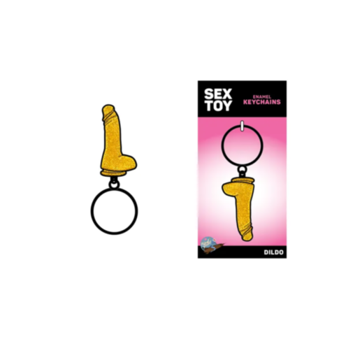 This keychain, designed as a gold-colored dildo, is a playful Novelty Accessory. The packaging features the name "Wood Rocket-Gold Dildo Keychain" set against a pink gradient background with a small planet illustration.