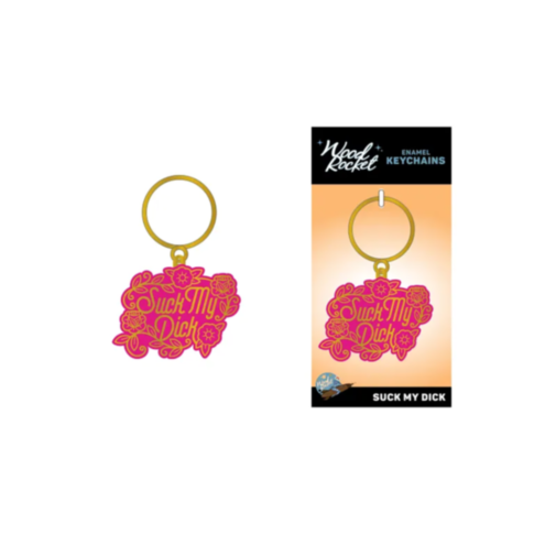 A vibrant enamel keychain with floral patterns and bold "Suck My Dick" text. This novelty item is available both individually and in packaging labeled "Wood Rocket-Suck My Dick Keychain," featuring pink and gold lettering along with floral accents.