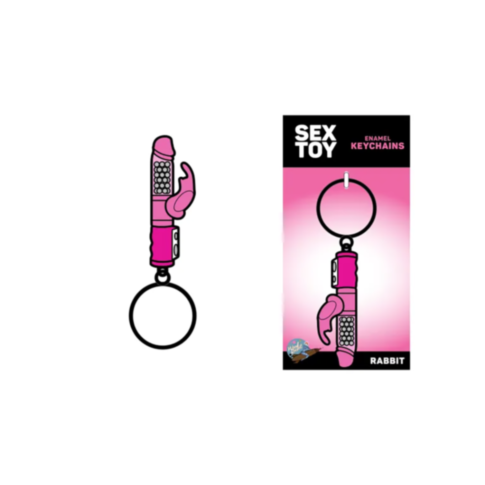 This unique accessory, the Wood Rocket-Rabbit Keychain, is designed in the shape of a pink rabbit vibrator and comes packaged in a playful box. The packaging vividly displays "Sex Toy Enamel Keychains Rabbit" on a striking pink background.