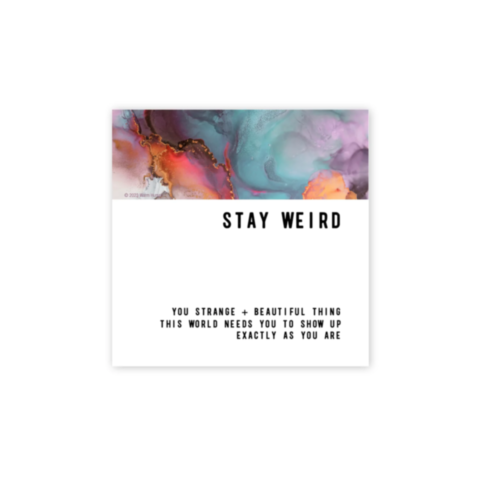 The Stay Weird Magnet showcases a minimalist design featuring a vibrant abstract pattern inspired by alcohol art. At the top, it displays the phrase "STAY WEIRD," while the bottom reads, "You strange + beautiful thing. This world needs you to show up exac