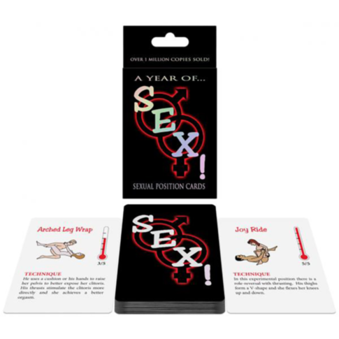 A box of A Year Of Sex! Card Game is shown with two cards in front, each depicting a Kama Sutra position, descriptions, and a rating scale to inspire new experiences.