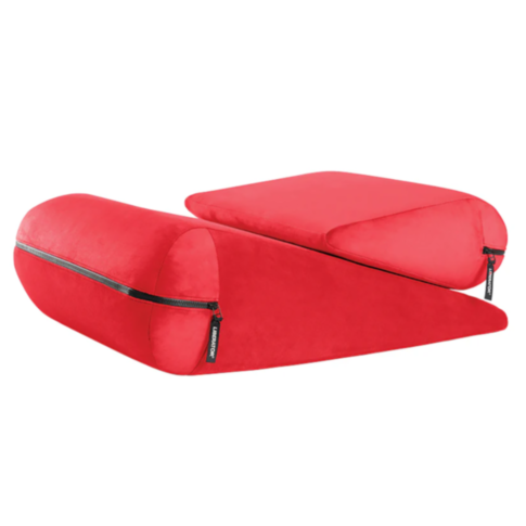 The Jaz Duet - Jaz & Jaz Ramp Combo-Red is a wedge-shaped cushion set with black zippers, designed to provide support or relaxation. It consists of two pieces that can be arranged in various positions, making it perfect for back or leg elevation. Its comf