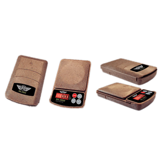 The MX 500 500g x 0.1g pocket scale features a sleek brown casing, shown from various angles. It has a digital display and buttons for effortless adjustments, prominently displaying the brand logo.
