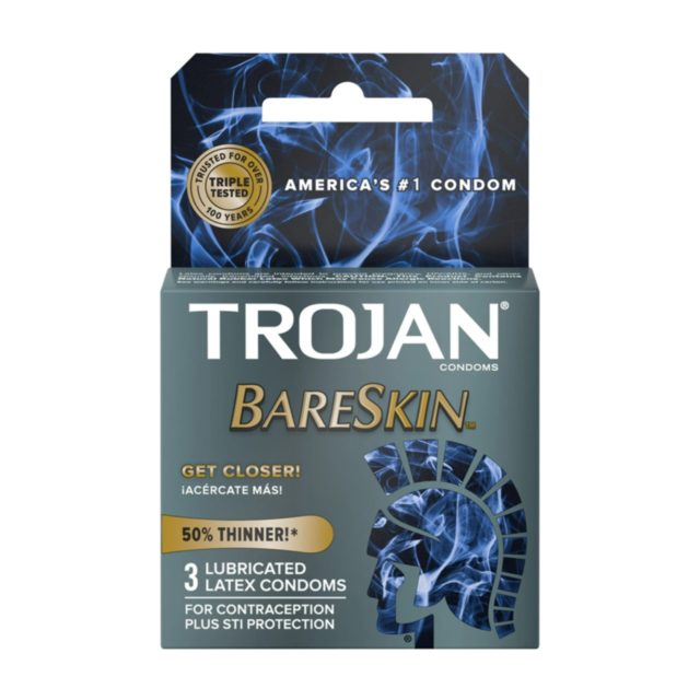 The image shows a box of Trojan BareSkin 3pk condoms, labeled as Americas #1 Condom. The packaging highlights these premium lubricated latex condoms are 50% thinner for better intimacy, offering contraception and STI protection. The iconic Trojan helmet i