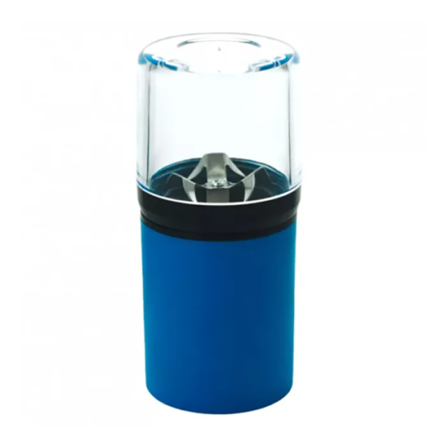 The Lens Blue Mini Electric Grinder comes with a blue base and a transparent lid, allowing you to easily see its sharp, sturdy blades for efficient grinding.