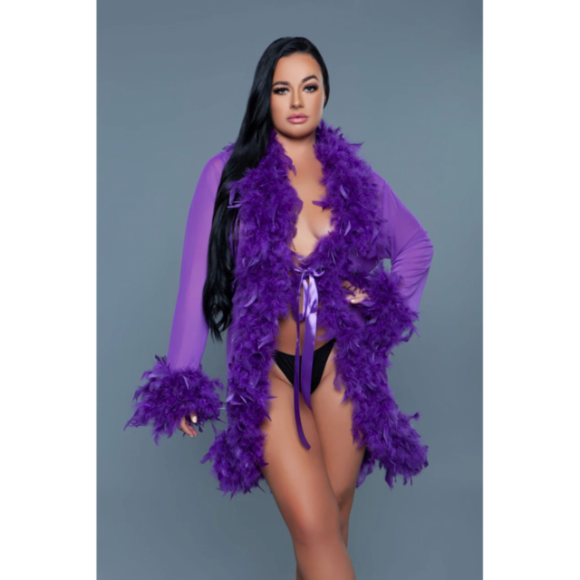 A graphic with a green background features a white rocket soaring past a circular planet adorned with feather accents and ribbon ties. Above, the words "Knee length Feather Robe with Ribbon Ties Violet" are displayed in bold white text.