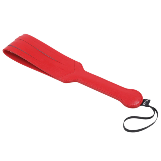 A vibrant green placeholder image showcases a gray rocket surrounded by stars, capturing the thrill of impact play. Above the graphic, the words "No Image" appear, suggestive of the striking red vegan leather craft of an S&M Amor Loop Paddle.