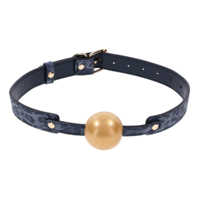 The Cougar Ball Gag features a luxurious dark blue leather strap with a gold spherical accent at its center. It is designed with adjustable metal buckles, ensuring both style and comfort for an enhanced sensory experience.