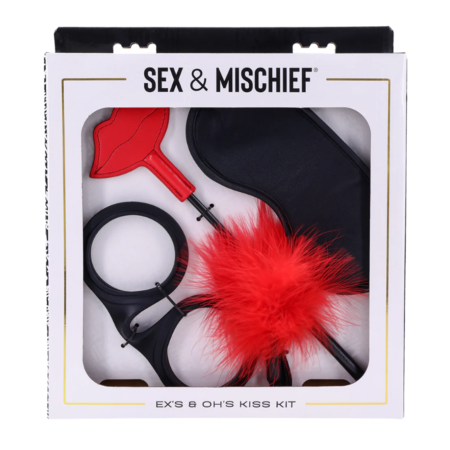 The Exs & Ohs Kiss Kit offers a red feather tickler, black handcuffs, black blindfold, and a red lips-shaped paddle—all showcased in a clear window—for unforgettable intimate moments.