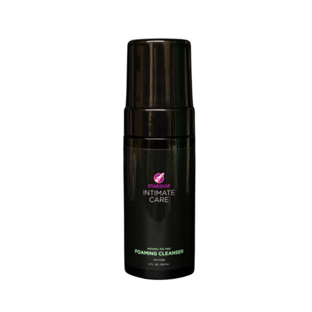 The sleek black bottle of Starship Intimate Care Tea Tree Foaming Toy Cleaner 4oz features a purple label, highlighting its natural tea tree oil content for disinfecting and maintaining hygiene. This versatile 4 fl. oz. (120 ml) cleanser is perfect as a t