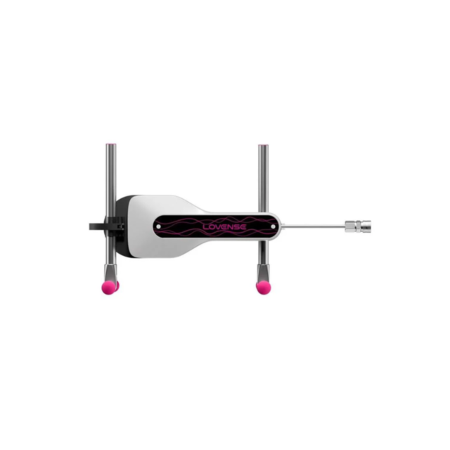 The Lovense Mini Sex Machine is a stylish device in black and pink, equipped with thrusting arms and rods extending from both ends. At its center is a compact control unit. Accompanied by attachments on each side, it is displayed against a crisp white bac