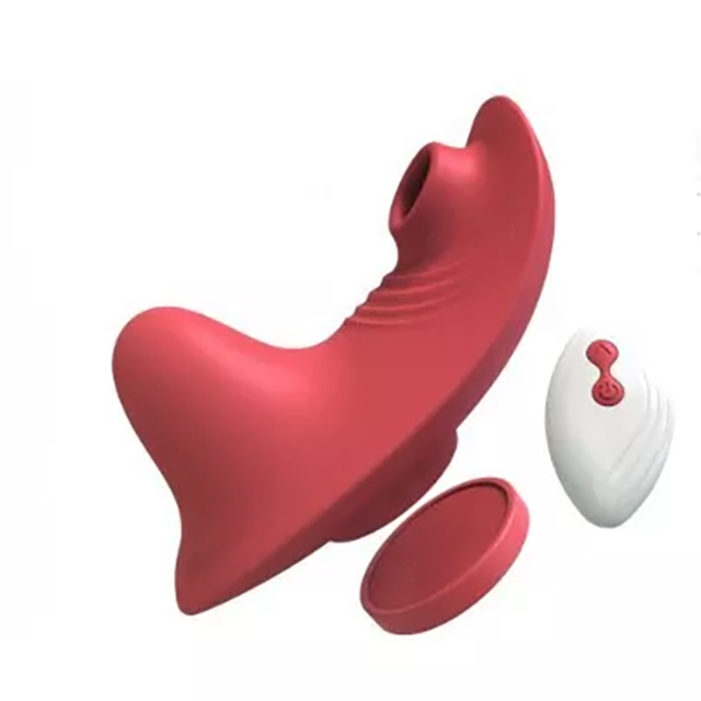 The Amie-Sweet Secret Sucking Panty Vibe with RC features a red, curved design with a round base and small opening. It comes with a sleek white, oval remote control and lid, offering various suction modes for discreet yet powerful experiences. Displayed o