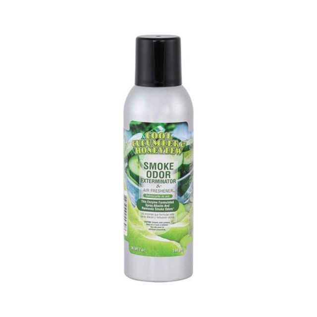 A straightforward design featuring a rocket and planet within a circle, accompanied by stars, set against a refreshing cucumber green background, below the text Smoke Odor Spray Cool Cucumber & HoneyDew.