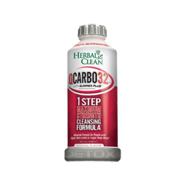 A green background with white text at the top reads "Herbal Clean Q Carbo 32 Tropical 32oz." Below, a white graphic of a rocket ship, evocative of a maximum strength cleanser, is surrounded by a circular border with stars.