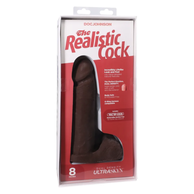 The packaging for The Realistic Cock Ultraskyn w VUL 8in-Chocolate by Doc Johnson features the ultra-realistic toy in a see-through box with bold red and white branding. Made with dual-density Ultraskyn, it provides an authentic feel and measures 8 inches