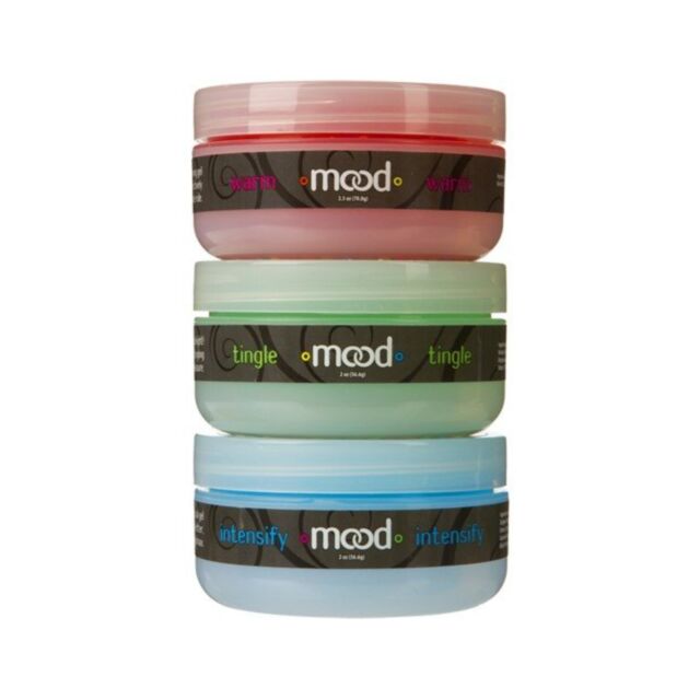 A green background featuring a white silhouette of a rocket and stars introduces the Mood Arousal Gels 3 Jars: Warm, Tingle & Intensify. The phrase "No Image" is positioned above this design, enticing you to explore thrilling new levels in your foreplay e