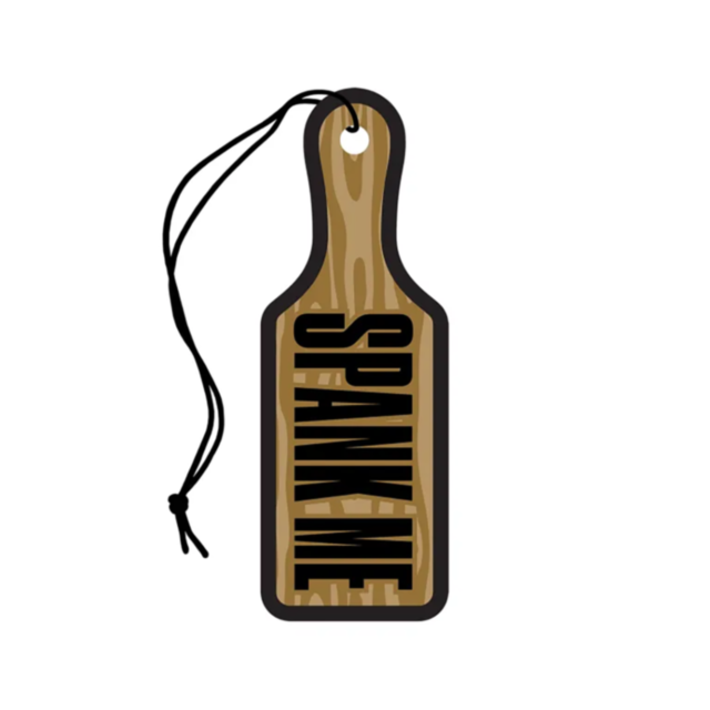 A cartoon depiction showcases the "Wood Rocket-Air Freshener-Spank Me Paddle," emitting a gentle sandalwood fragrance reminiscent of an air freshener. The wooden paddle prominently displays the words on its surface and includes a black string threaded thr