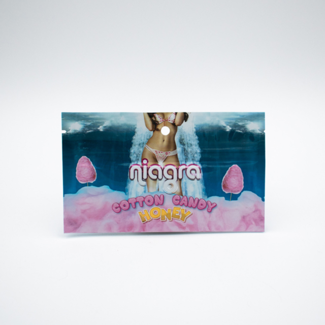 A green background showcases a gray rocket icon, representing the soaring potential of NIAGRA HONEY (WOMEN) for enhanced libido, surrounded by a ring and stars beneath the text No Image.
