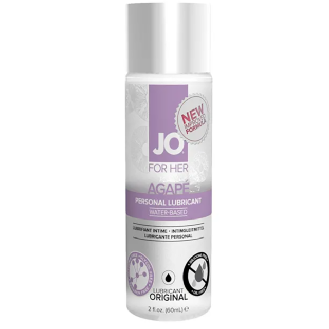 A green background displaying the text "No Image" sits above a grey rocket ship soaring upwards, encircled by stars and a circular frame—symbolizing openness to possibilities, with consideration for silicone and glycerin sensitivities. Product: JO Agape O