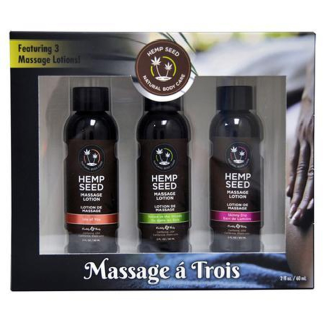A green background with a gray illustration of a rocket inside a circle, surrounded by small stars. The text "Massage A Trois Gift Set Box" is displayed at the top, evoking the allure of aromatic massage lotions in its simplicity.