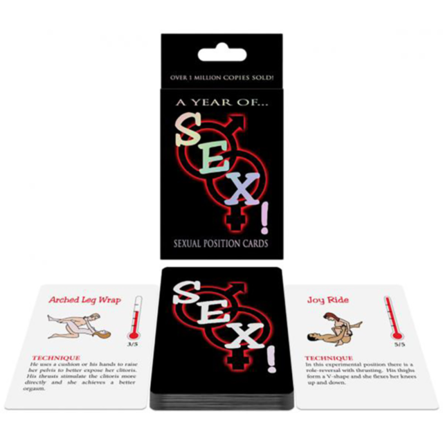 A box of A Year Of Sex! Card Game is shown with two cards in front, each depicting a Kama Sutra position, descriptions, and a rating scale to inspire new experiences.