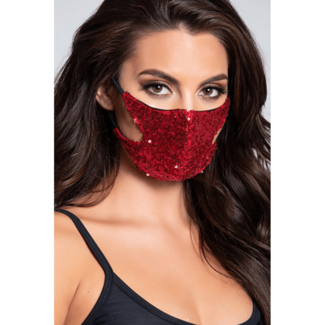 A green backdrop sparkles with sequins, showcasing a gray rocket icon orbiting a planet surrounded by stars. Above the icon, the text reads No Image. This unique design is from our Sequin Face Mask Red collection.