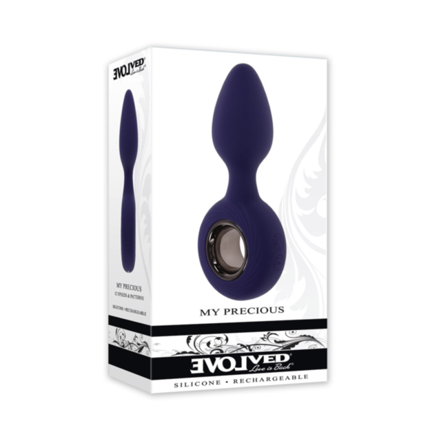 A purple background featuring a gray circular emblem with a rocket ship and stars, representing space exploration. The words "Evolved-My Precious Sil Rechargeable-Purple" hover above the emblem, subtly echoing the innovation of technologies like a waterpr