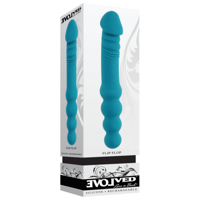 The Evolved- Sil Rechargeable Flip Flop-Teal is a teal silicone vibrator with a textured, ribbed shaft standing upright beside its packaging, featuring the Evolved brand. This dual-sided vibe is fully submersible for versatile pleasure.