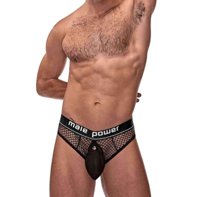 A black athletic mesh pouch encasing its contents, featuring the words "Cock Ring Thong Black S M" above a white outline of a rocket inside a circle, surrounded by stars.
