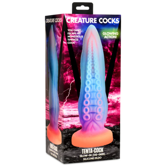 A vibrant graphic of a rocket icon inside a circle shines brightly, encircled by stars on a green background. Above it, the words "XR-Creature Cocks-Tenta-Cock GITD Silicone Dildo" lend a whimsical touch, evoking the charm of fantasy roleplay.