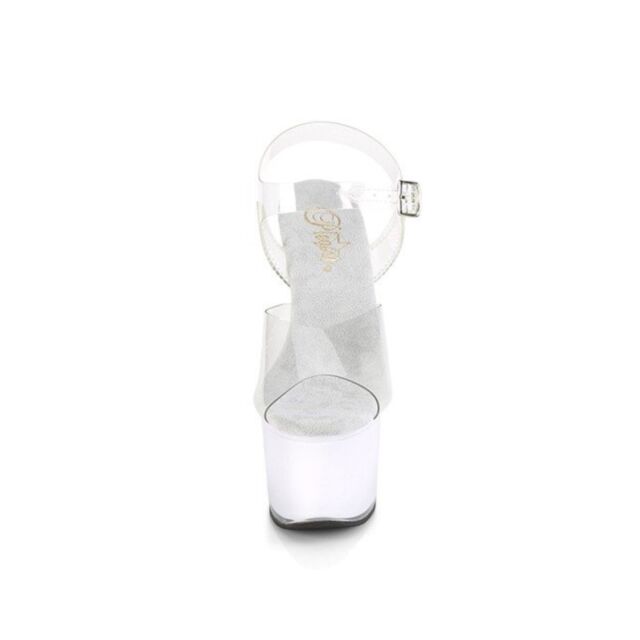 The ILLUMINATOR 7" Heel LED Ankle Strap Sandal, Size 8, evokes the thrill of space exploration with its futuristic design. Imagine it adorned with a green background featuring an icon of a rocket circling a celestial body and stars—charging via USB and il